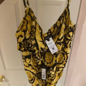 Versace body suit tag size 4